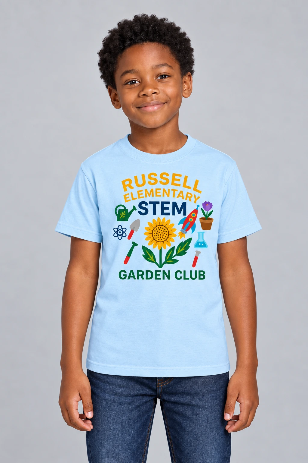 Boy model wearing the Russell Elementary STEM and Garden Club design on a light blue shirt