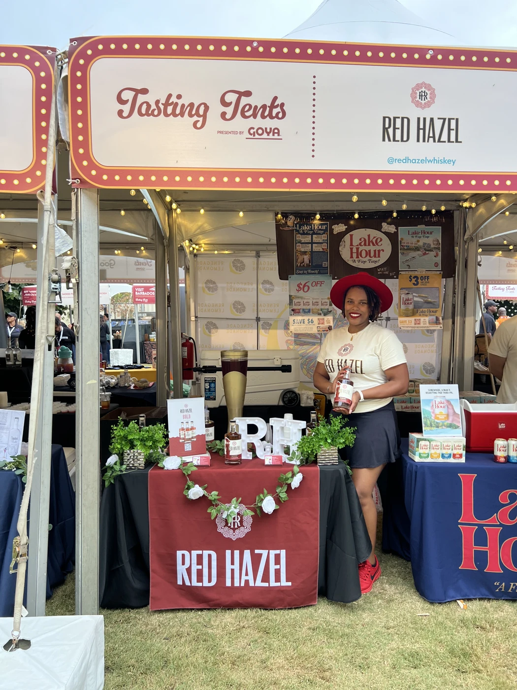 TK wearing a Red Hazel shirt at the food and wine event